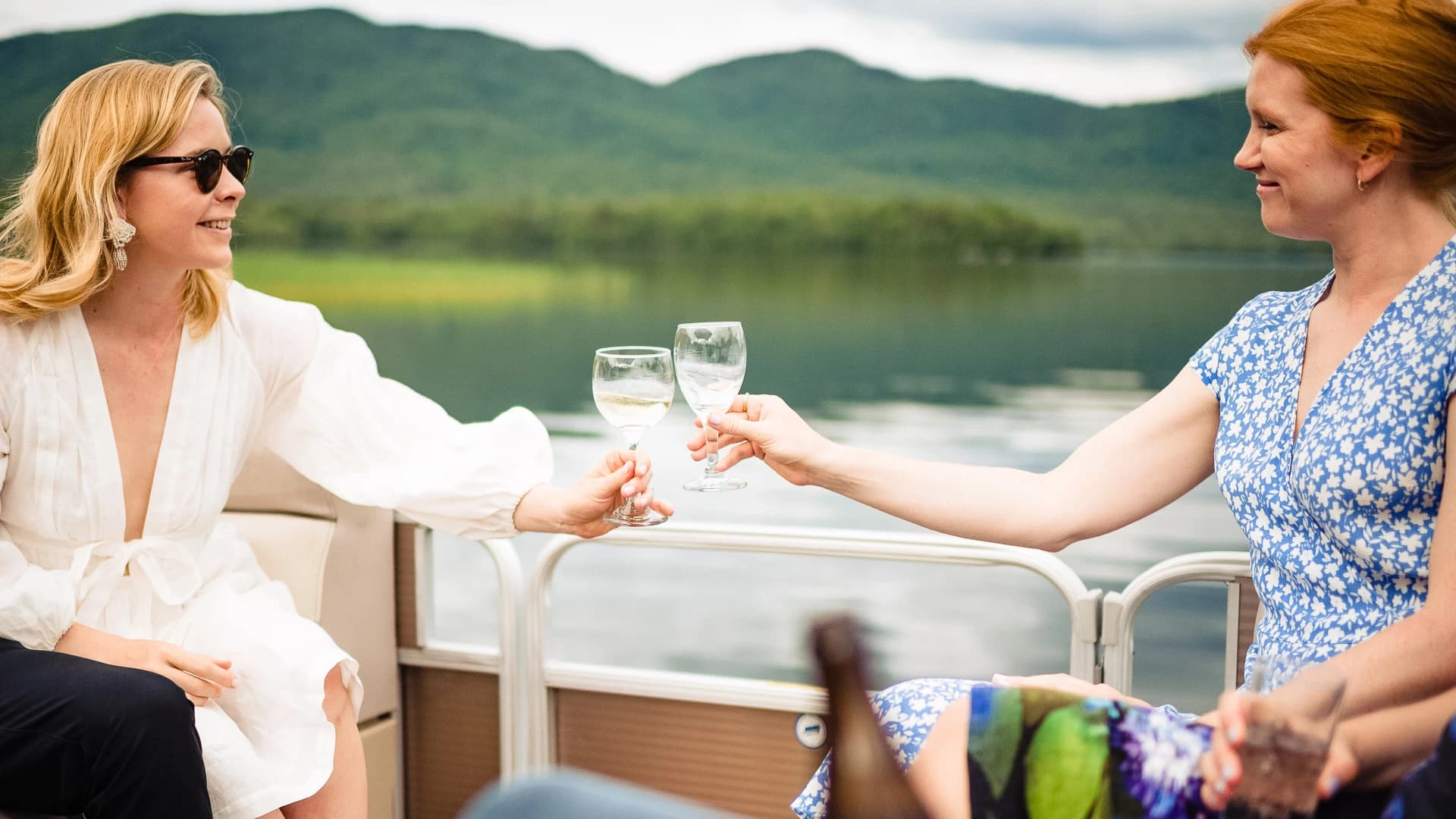 Guests toasting during a Mountain Top Resort boat ride